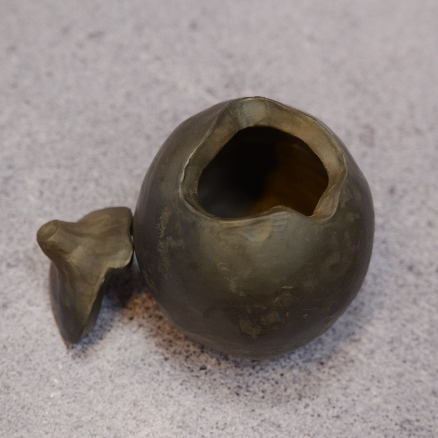 Podiņš ar vāciņu