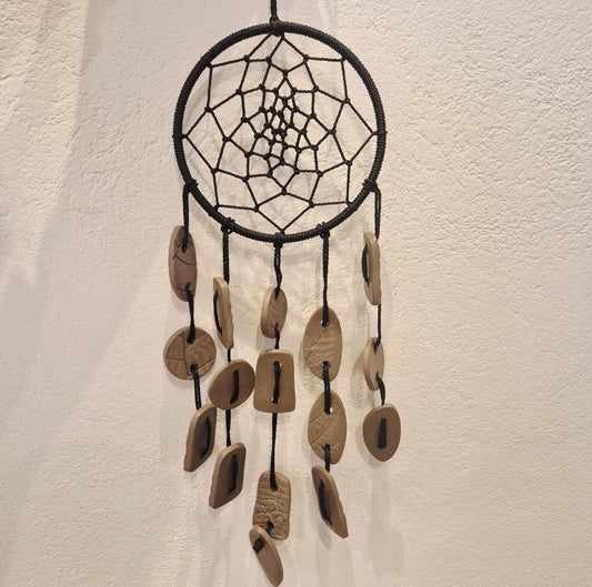 Mazais Sapņu ķērājs, melns